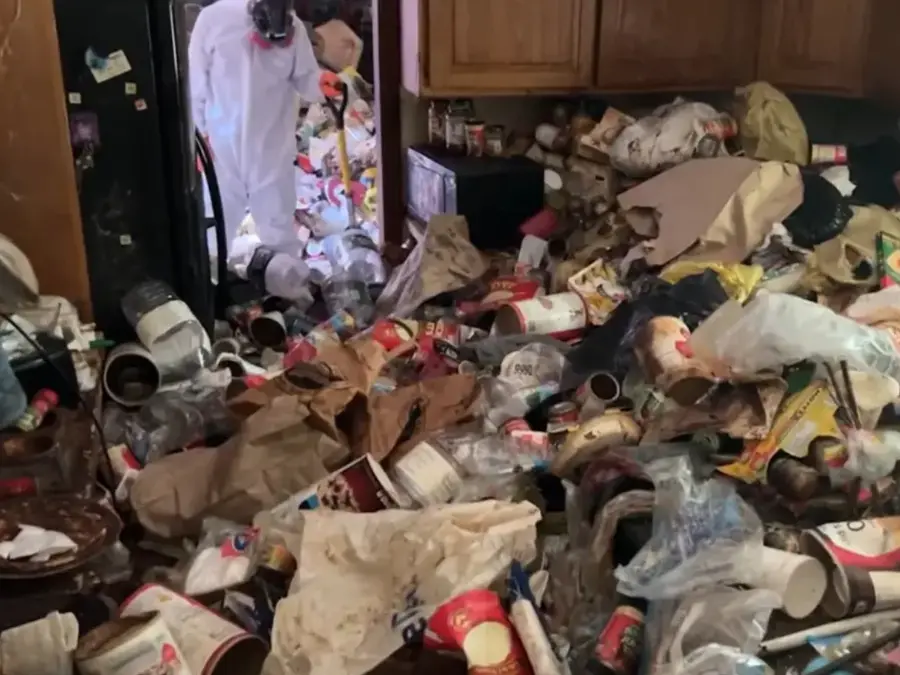 House of 'hoarder' horror: Mounds of garbage, faeces and a woman's skeleton