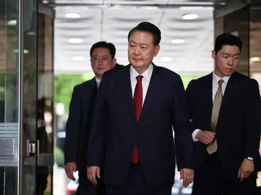 Seoul court issues warrant to arrest ex-president Yoon over martial law bid