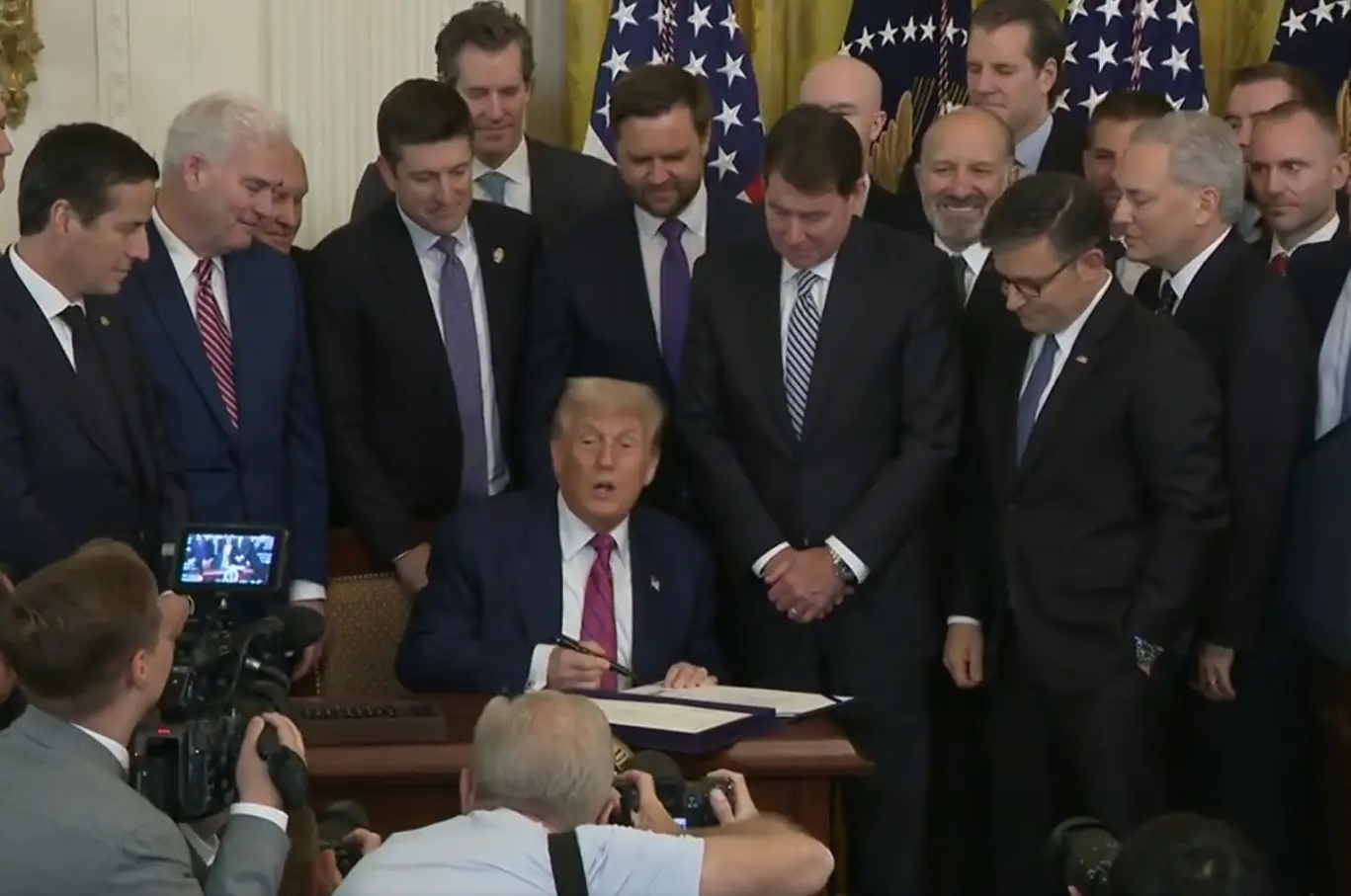Trump signs landmark crypto bill, the Genius Act, jokes ‘They named it after me’