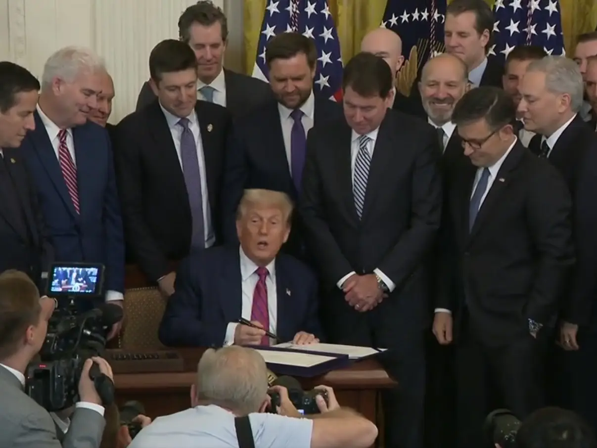 Trump signs landmark crypto bill, the Genius Act, jokes ‘They named it after me’