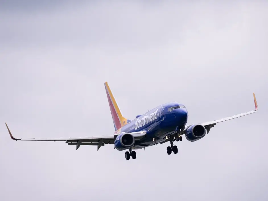 'People flew out of their seats': Plane with over 150 passengers nosedives 475 feet to avoid midair collision with fighter jet