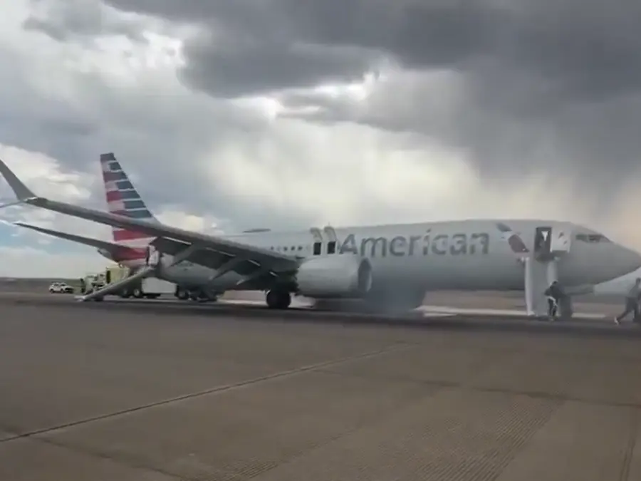 WATCH: Passengers evacuated from American Airlines jet as Boeing aircraft catches fire at Denver airport