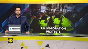 Pro And Anti-Migrant Protesters Face Off At London Hotel Housing Asylum Seekers