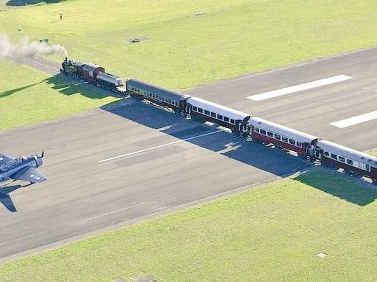 Unbelievable! The only airport in the world where trains pass across the runway— Check where it is Unbelievable! The only airport in the world where trains pass across the runway— Check where it is