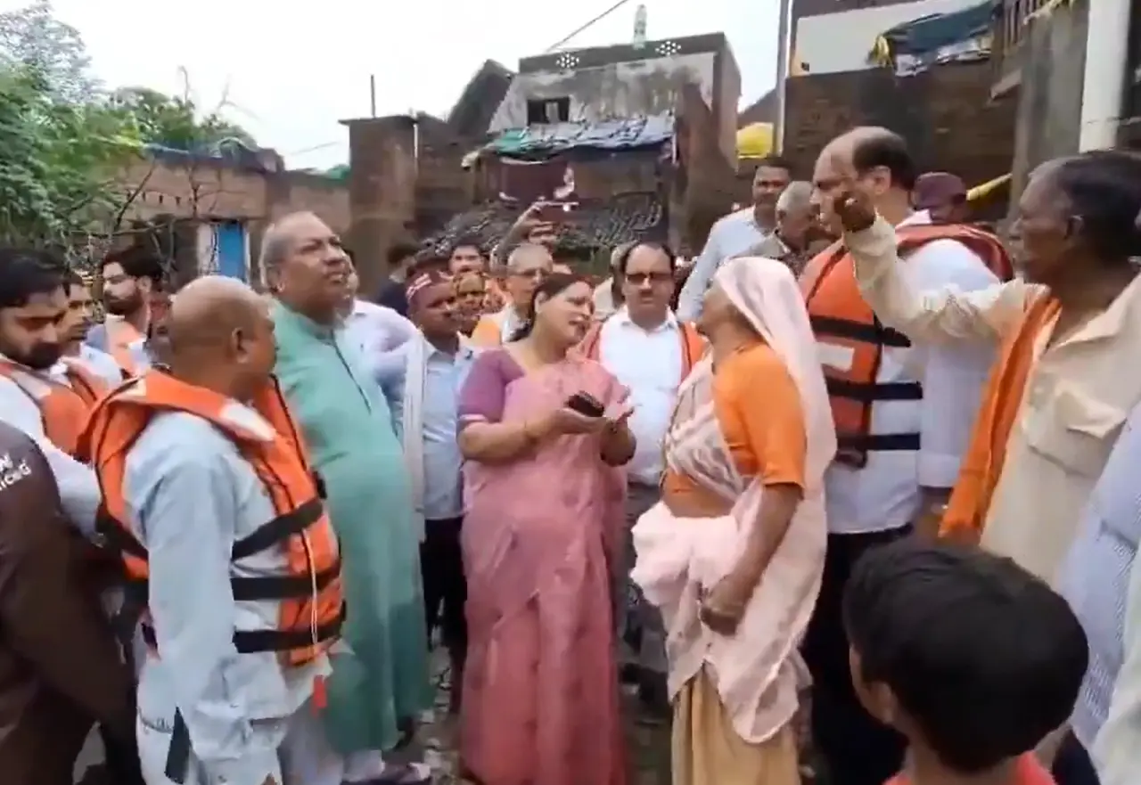 'Ganga comes to wash your feet': UP minister tells flood victims; Elderly woman asks him to 'take the blessings' — VIDEO
