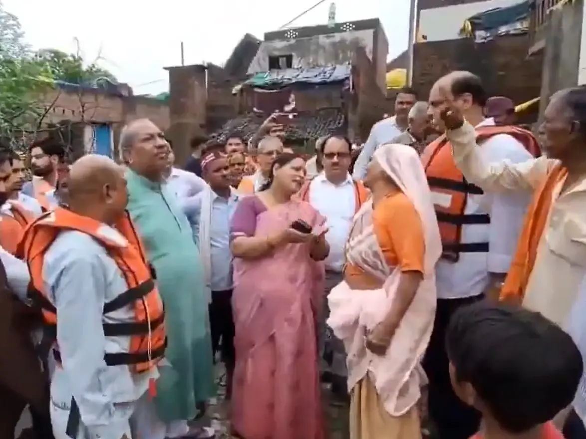 'Ganga comes to wash your feet': UP minister tells flood victims; Elderly woman asks him to 'take the blessings' — VIDEO