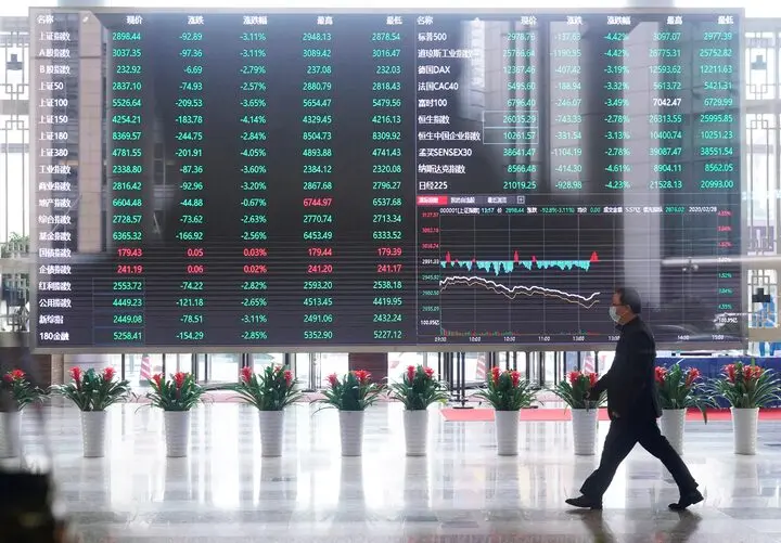 Asian markets edge higher ahead of key US economic data and trade developments