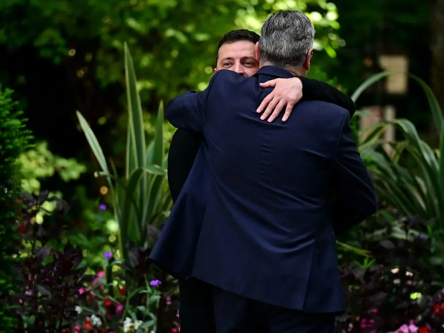Day before Trump-Putin meet, Zelensky meets, hugs UK PM