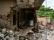 Pakistan monsoon floods: Death toll nears 400 as downpours continue