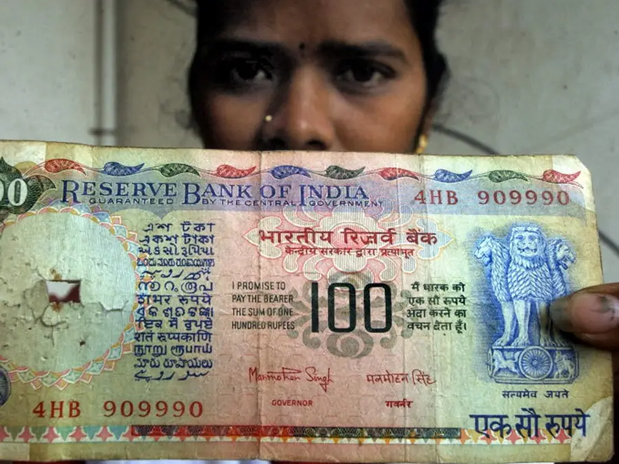 Why did the Indian rupee drop to an all-time low against the US dollar?