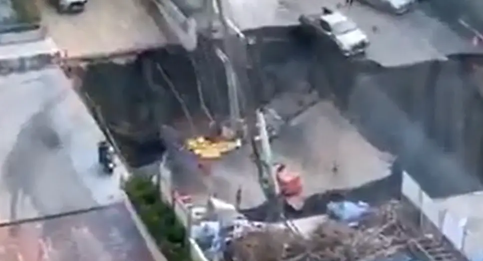 Massive sinkhole opens in Bangkok, swallows cars, electricity pole - WATCH