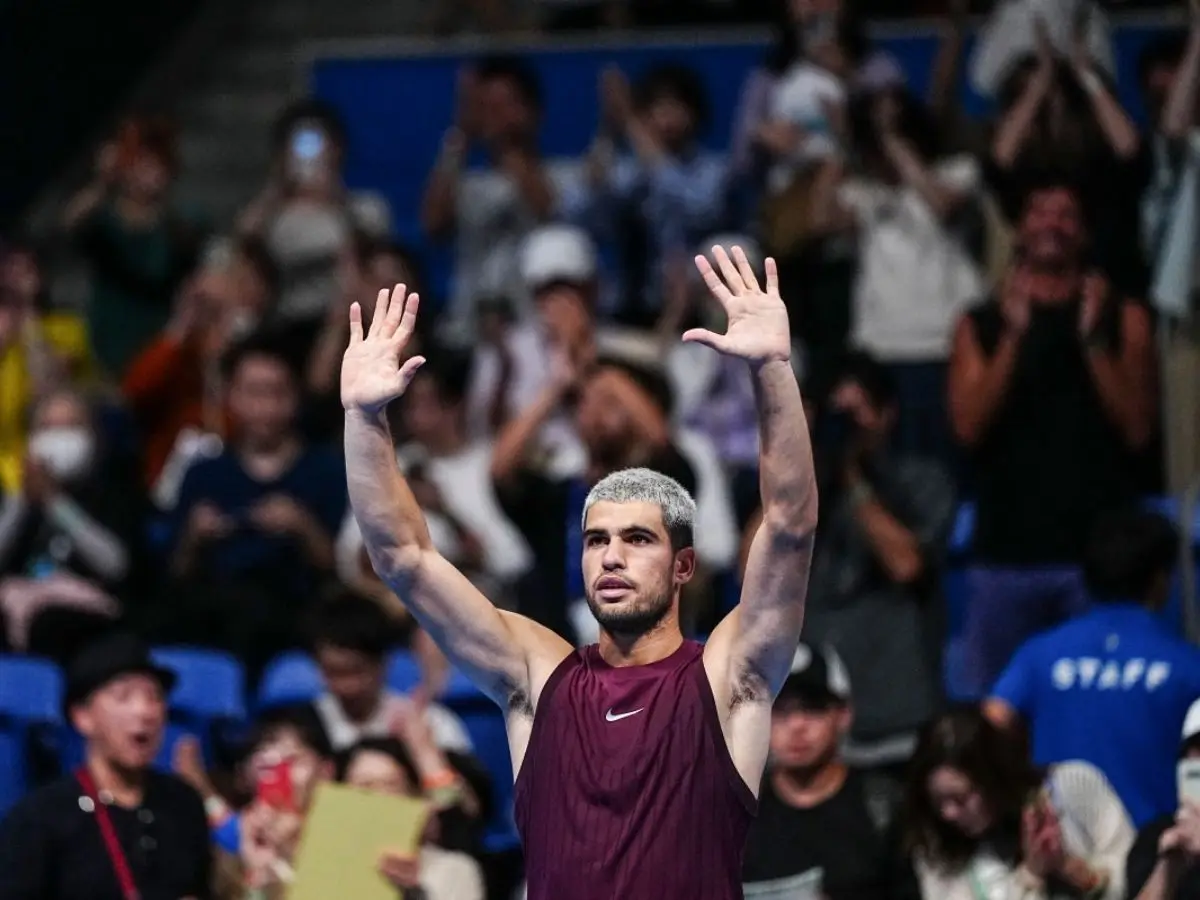 Carlos Alcaraz survives injury scare, rain delay to win Tokyo opener Carlos Alcaraz survives injury scare, rain delay to win Tokyo opener