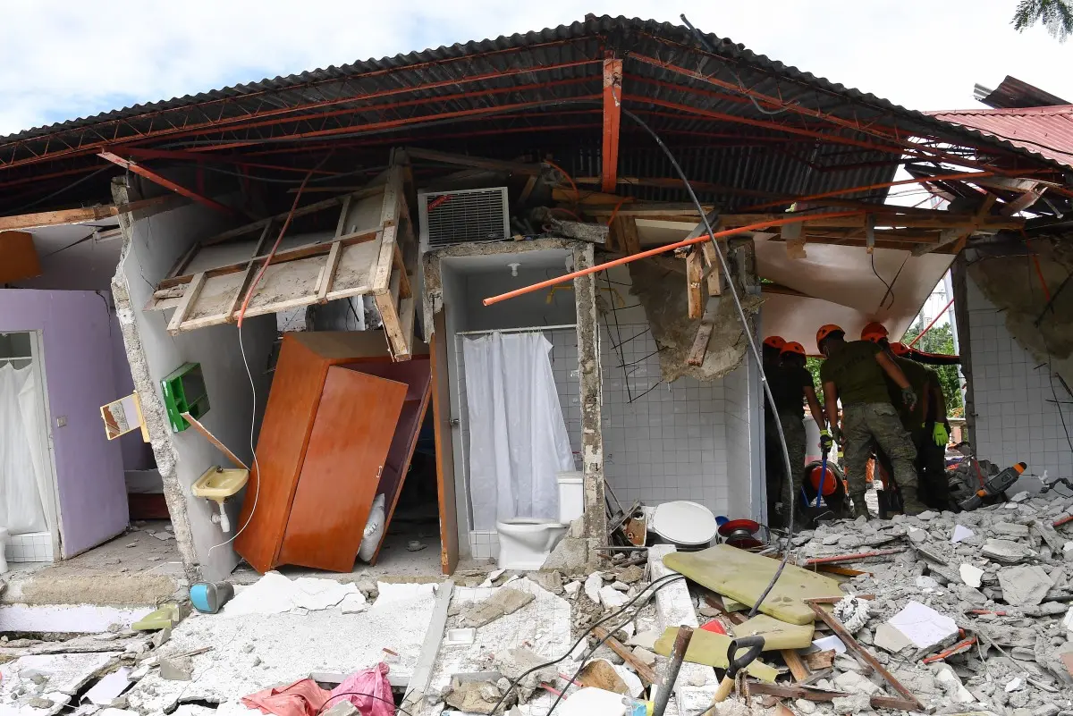 Families dig through rubble