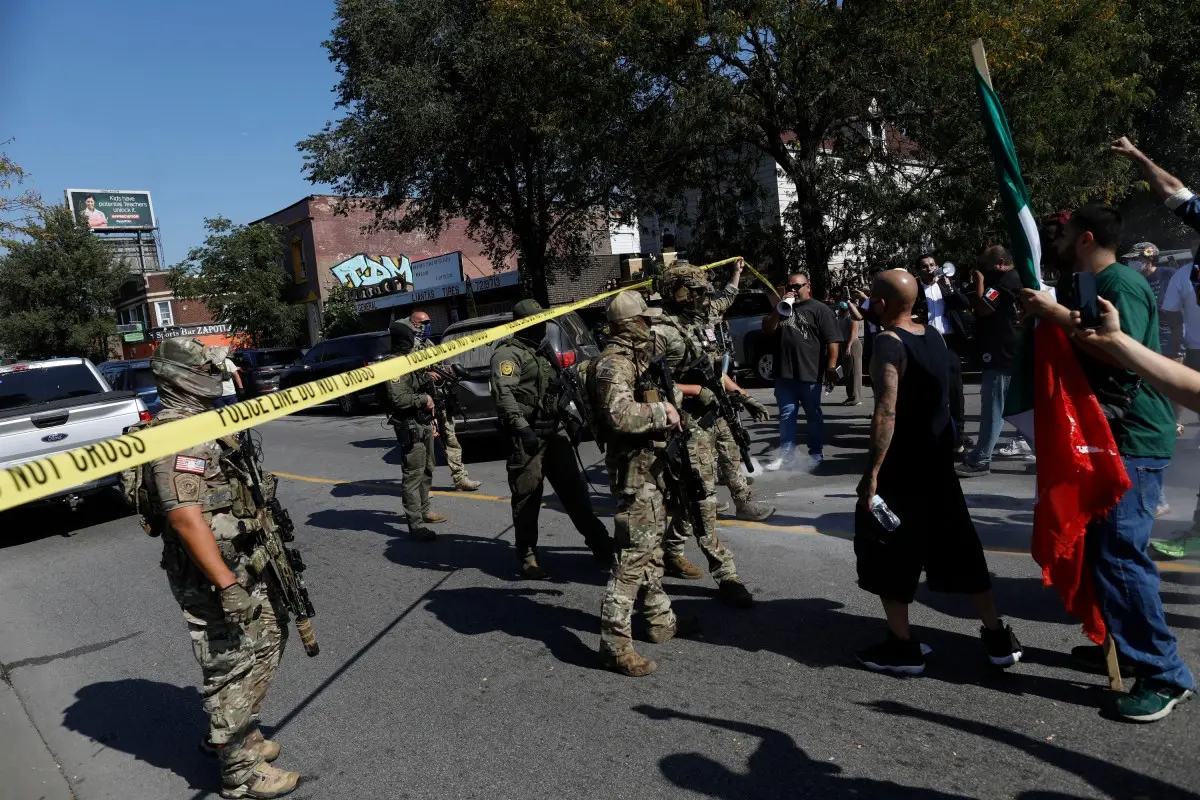 US federal agent shoots woman in Chicago hours after court blocks Trump’s troop order