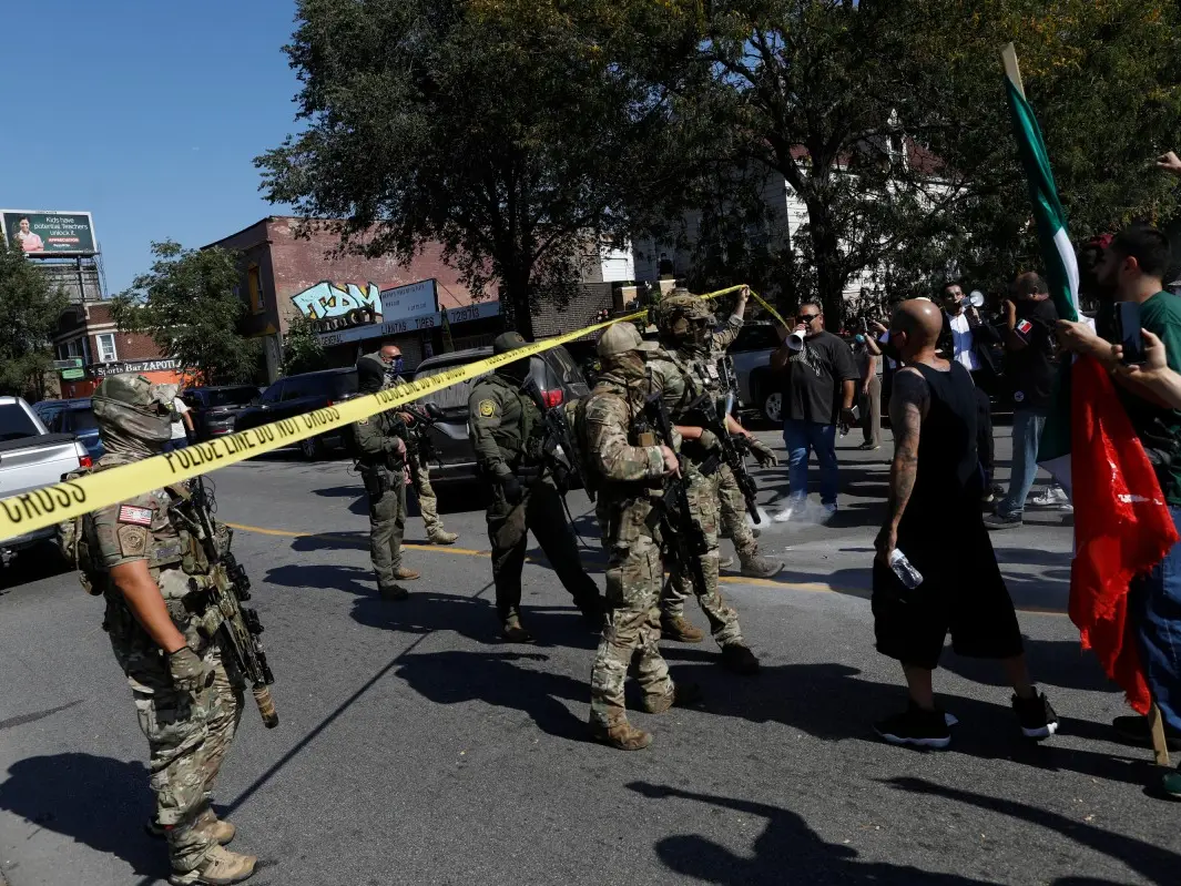 US federal agent shoots woman in Chicago hours after court blocks Trump’s troop order US federal agent shoots woman in Chicago hours after court blocks Trump’s troop order