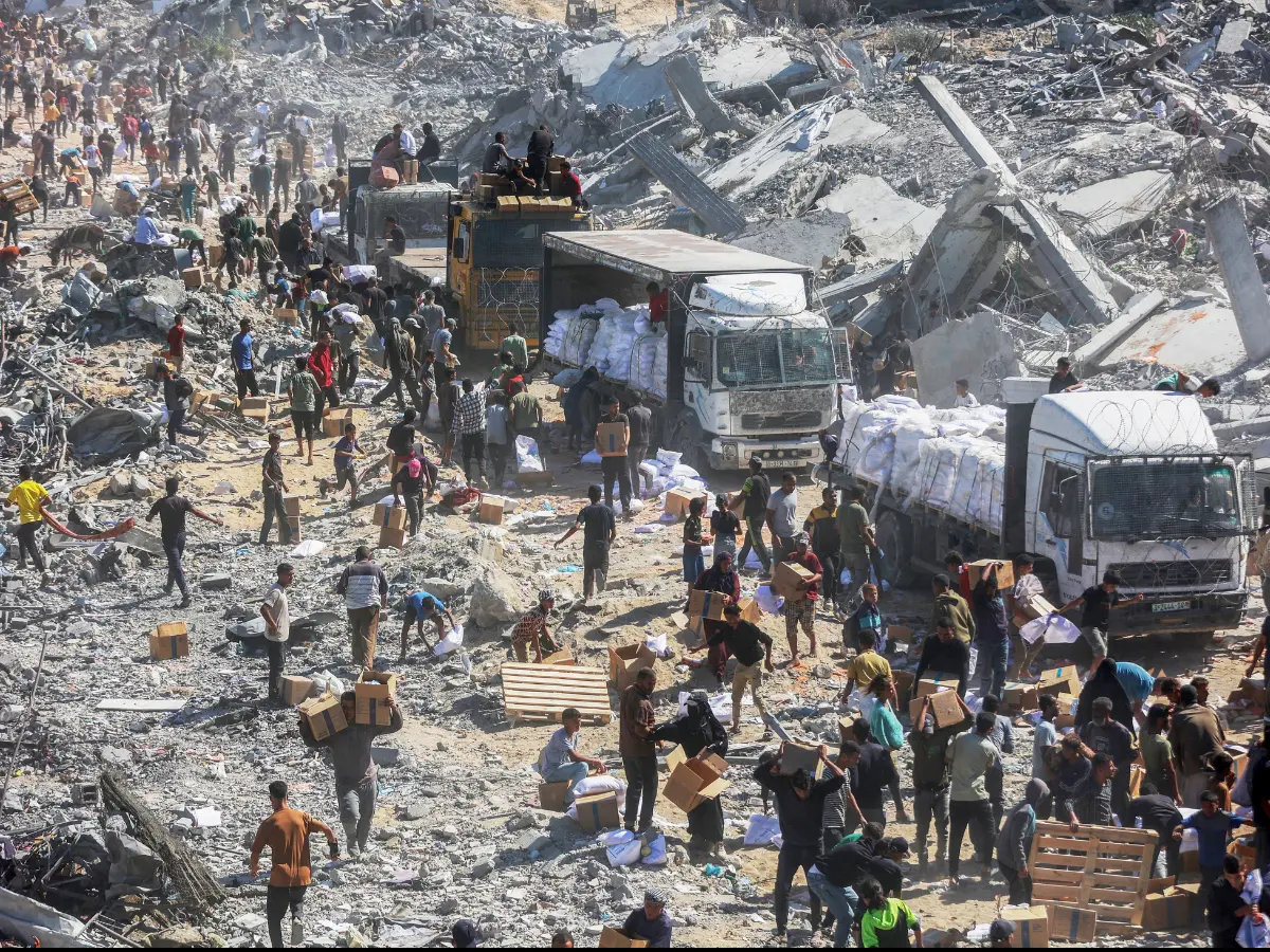 In Pics | Rummaging for hope: Hamas and Israel begin hostage exchange