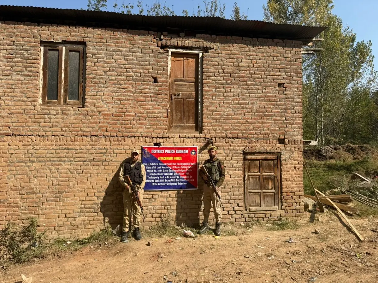 Jammu and Kashmir Police attach terror handler’s property under UAPA in Budgam Jammu and Kashmir Police attach terror handler’s property under UAPA in Budgam