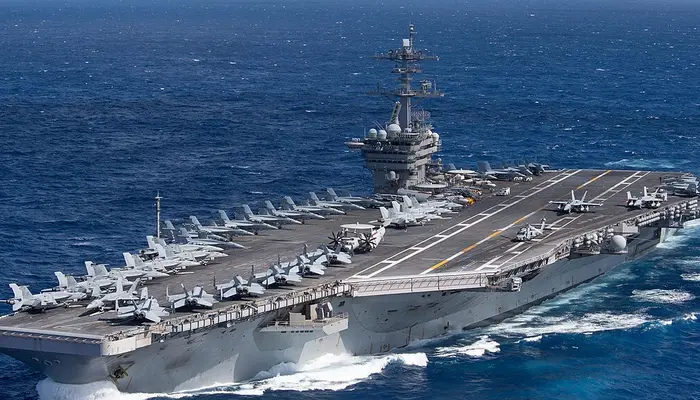 Can it go faster than 56 km/h? Why is the 2-nuclear-reactor-powered USS Abraham Lincoln so slow