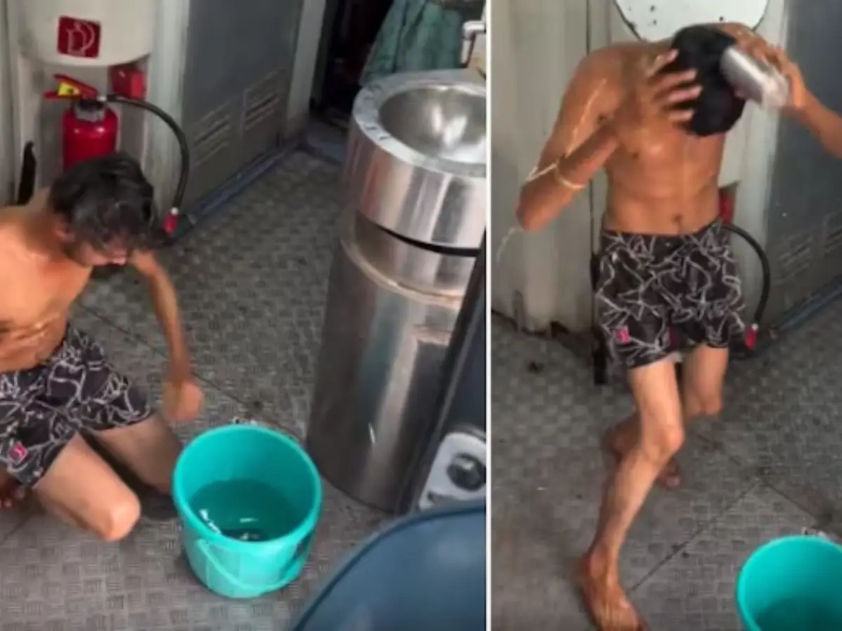 WATCH: Man booked for bathing in moving Indian train to 'gain popularity' on internet