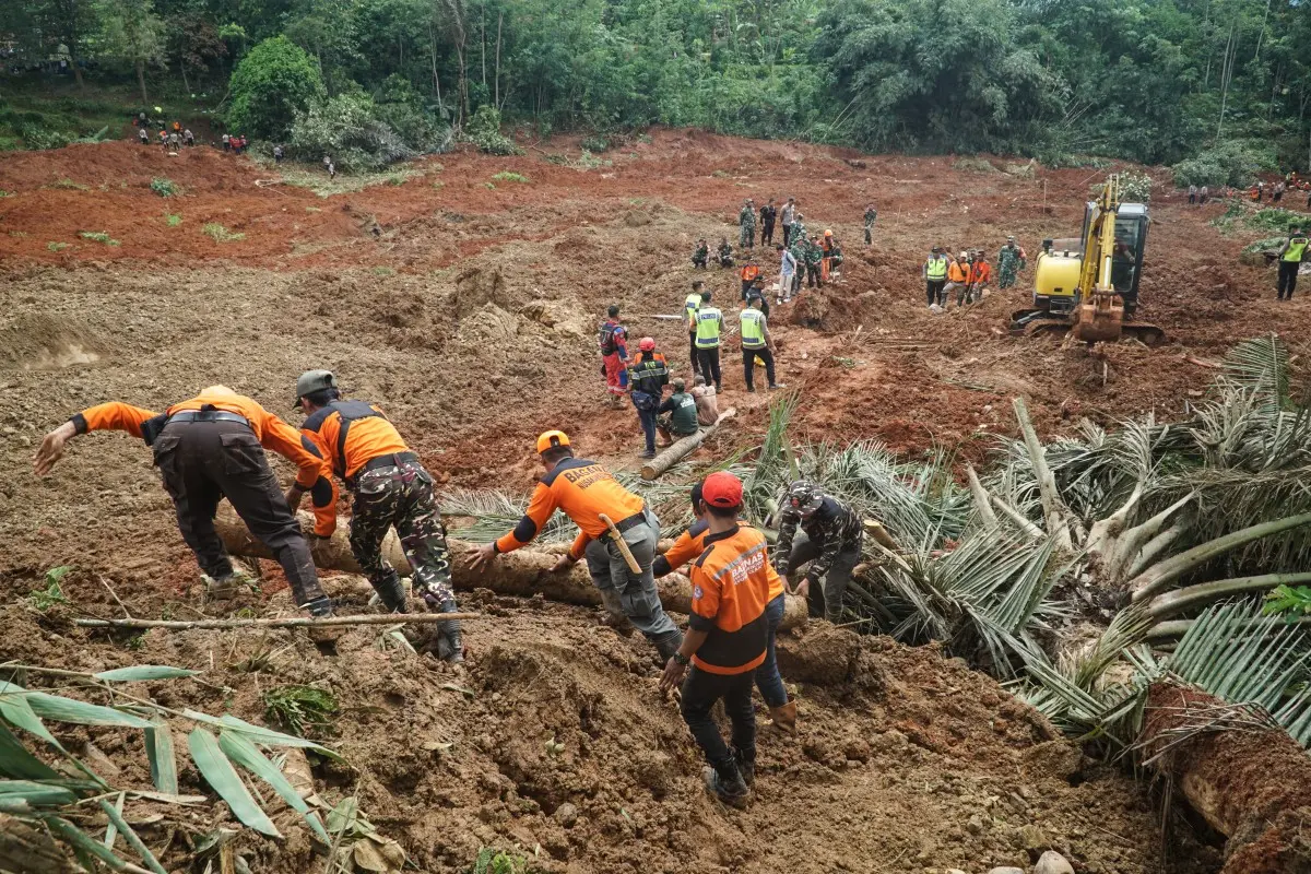 Indonesia landslide: 6 killed, 17 missing as operation on to rescue victims buried 8 meters deep