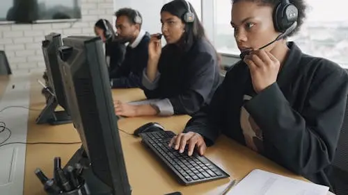 7. Telephone Operators – 80% AI impact