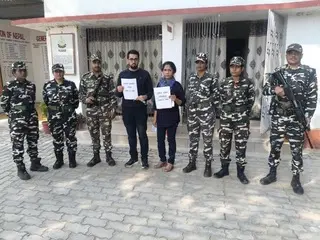 Two foreigners detained as India-Nepal boost border security Two foreigners detained as India-Nepal boost border security