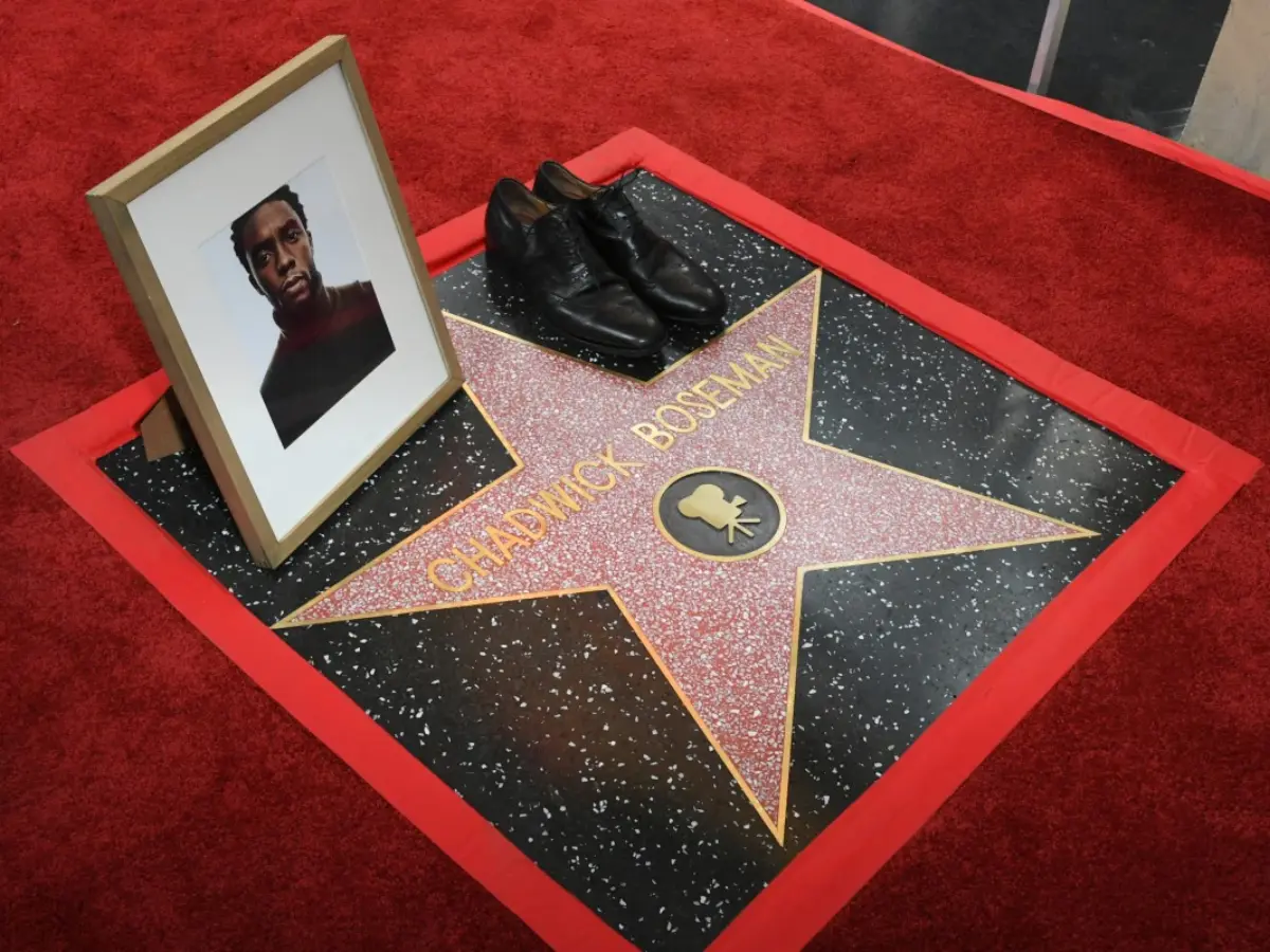 Chadwick Boseman’s widow places his shoes by his star during posthumous Hollywood Walk of Fame honour