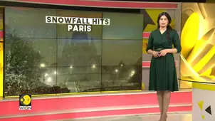 France: First winter storm blankets Eiffel tower & Paris in snow 