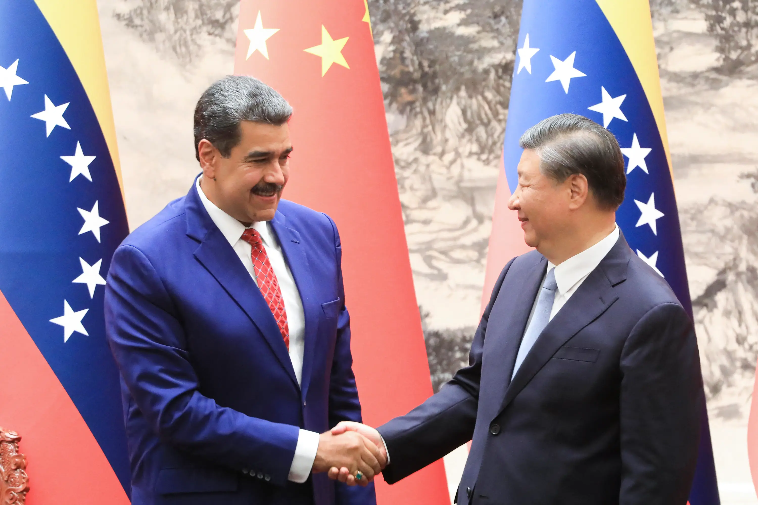 Xi Jinping backs Nicolas Maduro, blasts US meddling as warships circle Venezuela, vows to protect Caracas' sovereignty