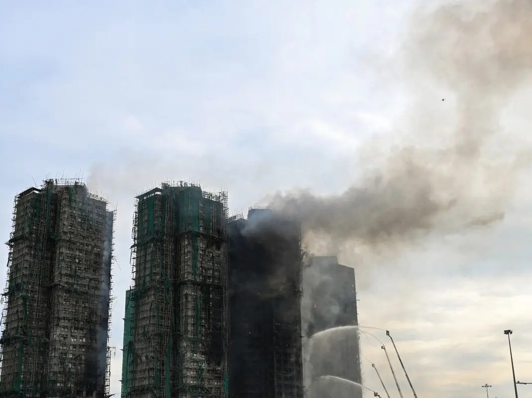 Hong Kong high-rise fire continues to burn; death toll rises to 55, hundreds still unaccounted for Hong Kong high-rise fire continues to burn; death toll rises to 55, hundreds still unaccounted for