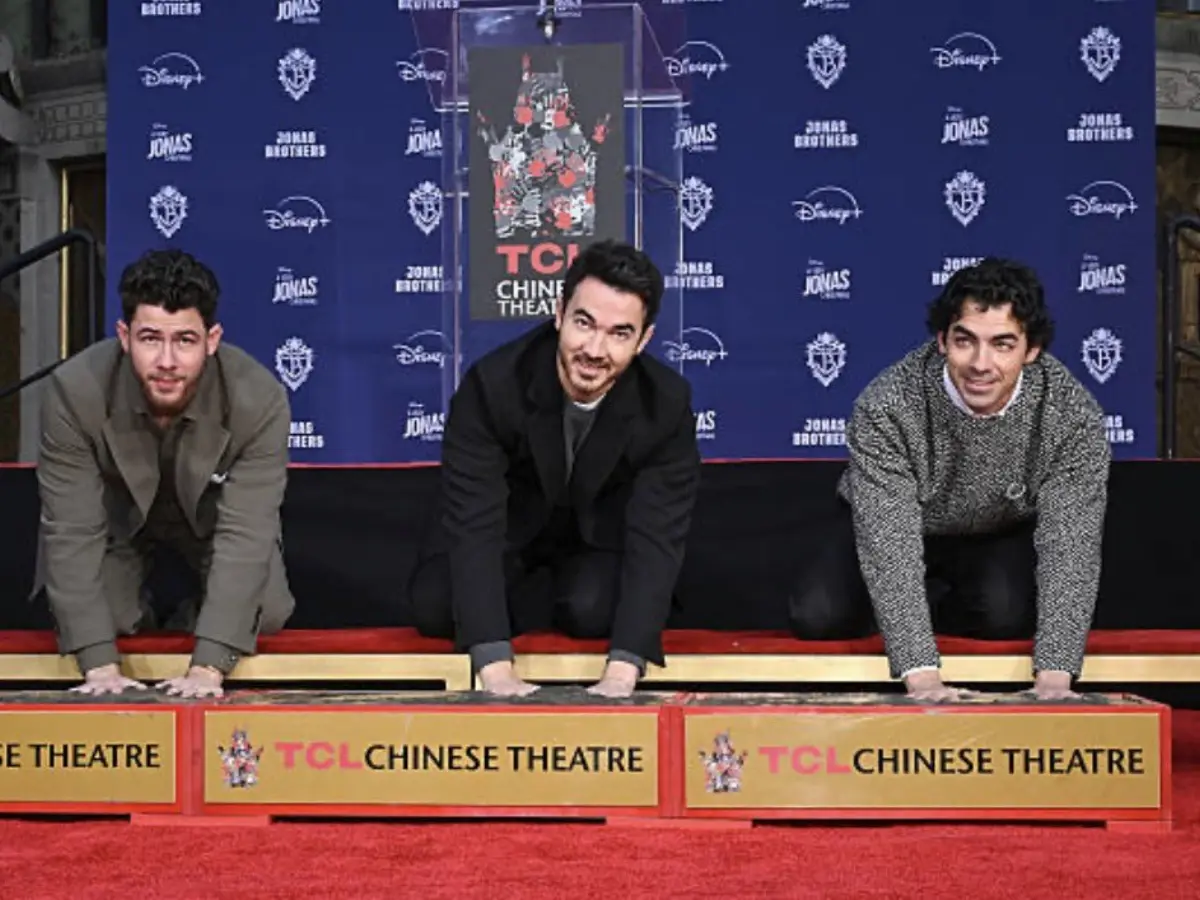 Jonas Brothers mark 20 years as band! Trio celebrate career milestone at TCL Theatre