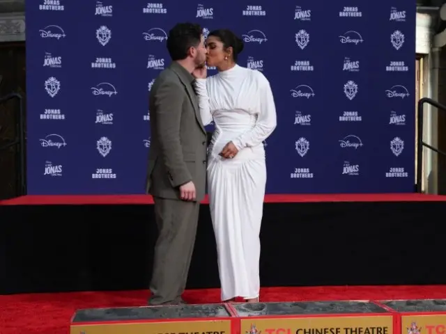 Priyanka Chopra steals a sweet kiss from Nick Jonas at Jonas Brothers' TCL Handprint ceremony Priyanka Chopra steals a sweet kiss from Nick Jonas at Jonas Brothers' TCL Handprint ceremony