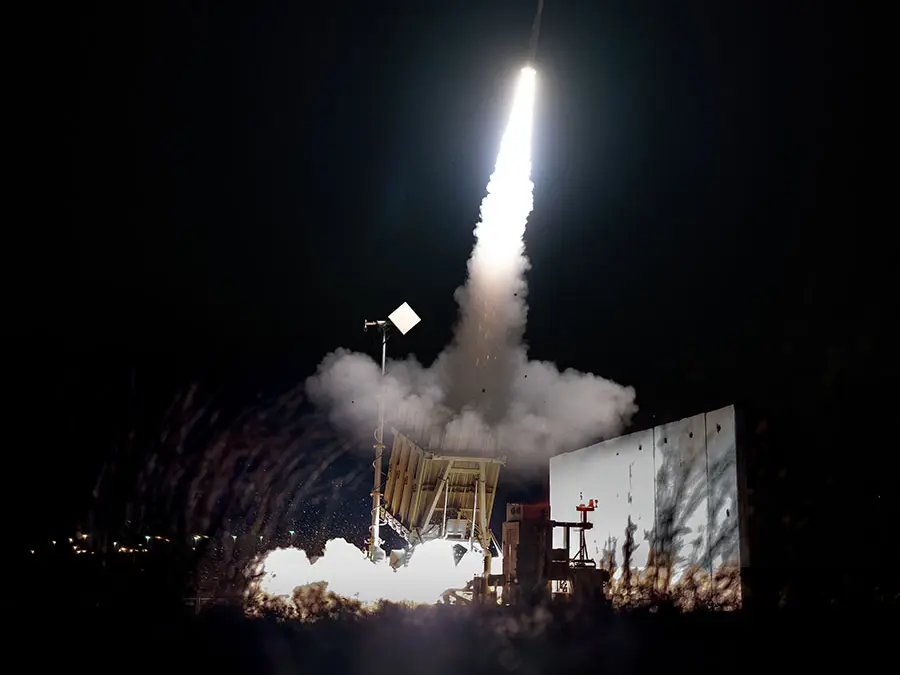 What are Tamir missiles and why does Israel rely on them for Iron Dome System?