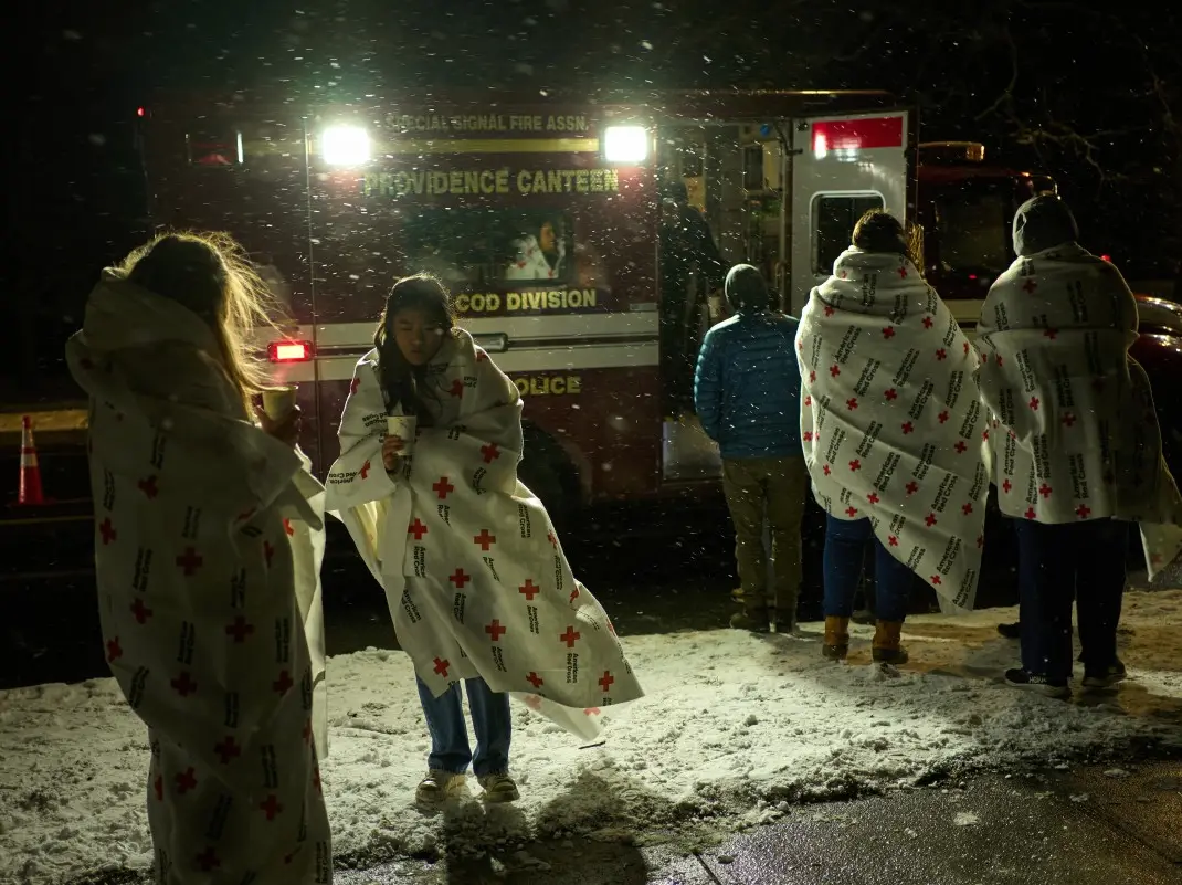 Brown University shooting: Victims identified as police release 'person of interest'; search for gunman resumes Brown University shooting: Victims identified as police release 'person of interest'; search for gunman resumes