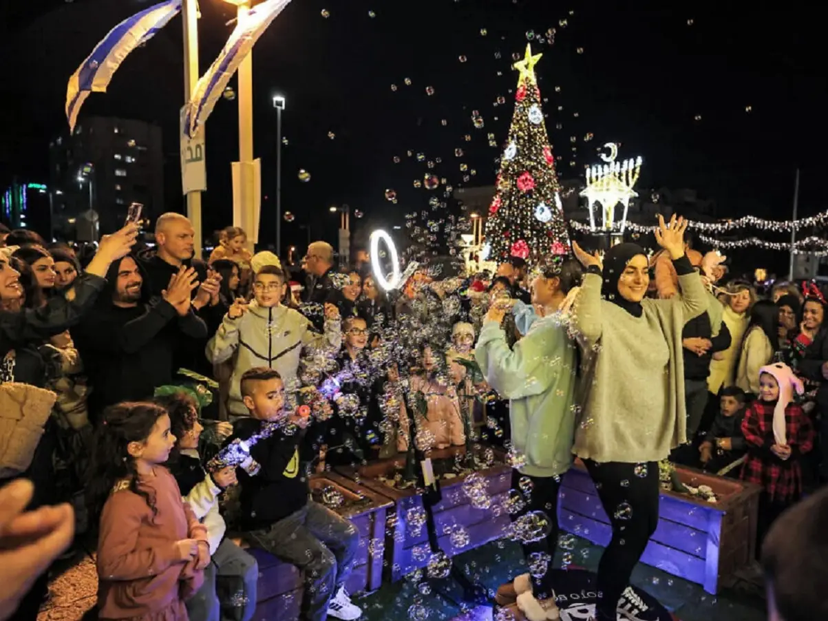 Israeli cops arrest Palestinian man dressed as Santa Claus at Christmas party Israeli cops arrest Palestinian man dressed as Santa Claus at Christmas party