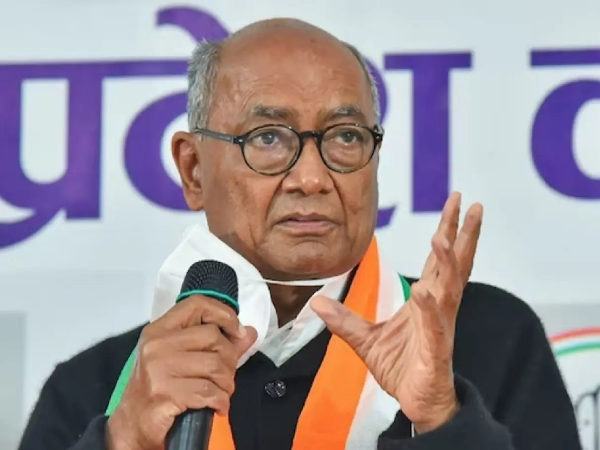 Chinks in Congress exposed?: Digvijaya Singh shares old photo of PM Modi, stirs row with BJP, RSS praise Chinks in Congress exposed?: Digvijaya Singh shares old photo of PM Modi, stirs row with BJP, RSS praise