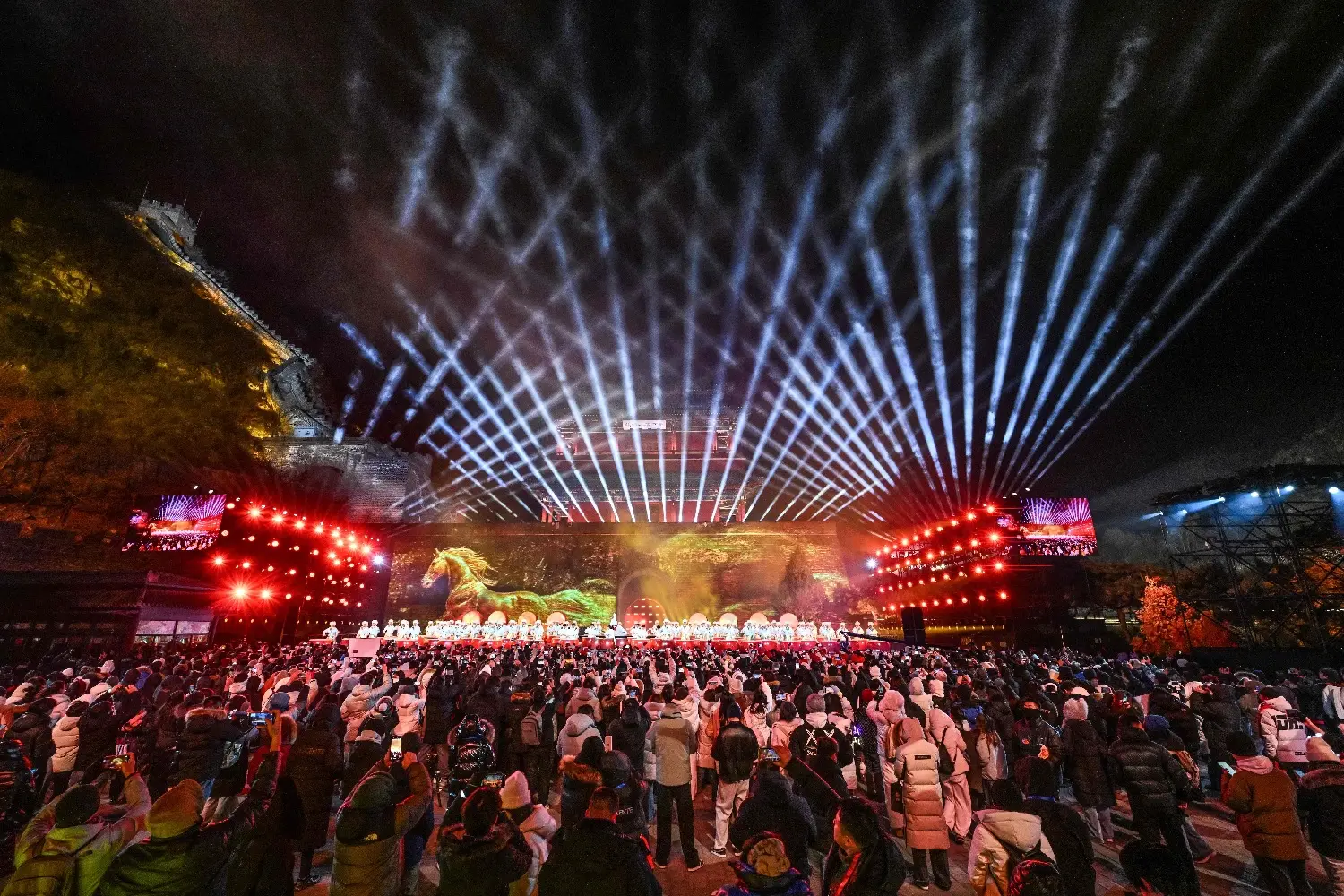 Dancers perform on stage at the Juyongguan Great Wall, Beijing