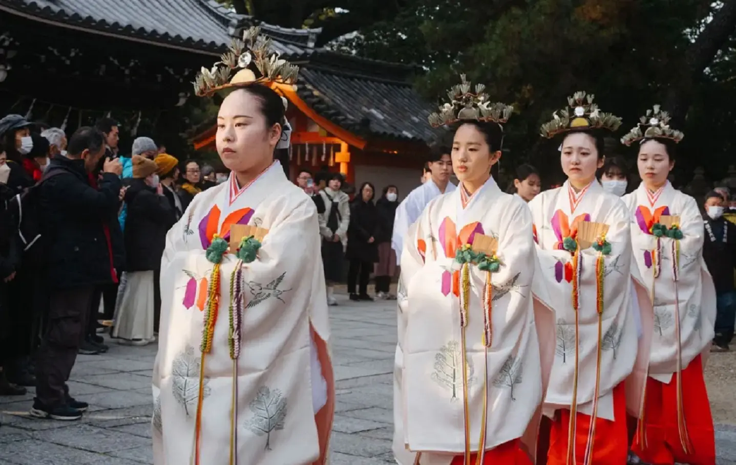 Young women take part in a Shinto ritual procession in Japan.