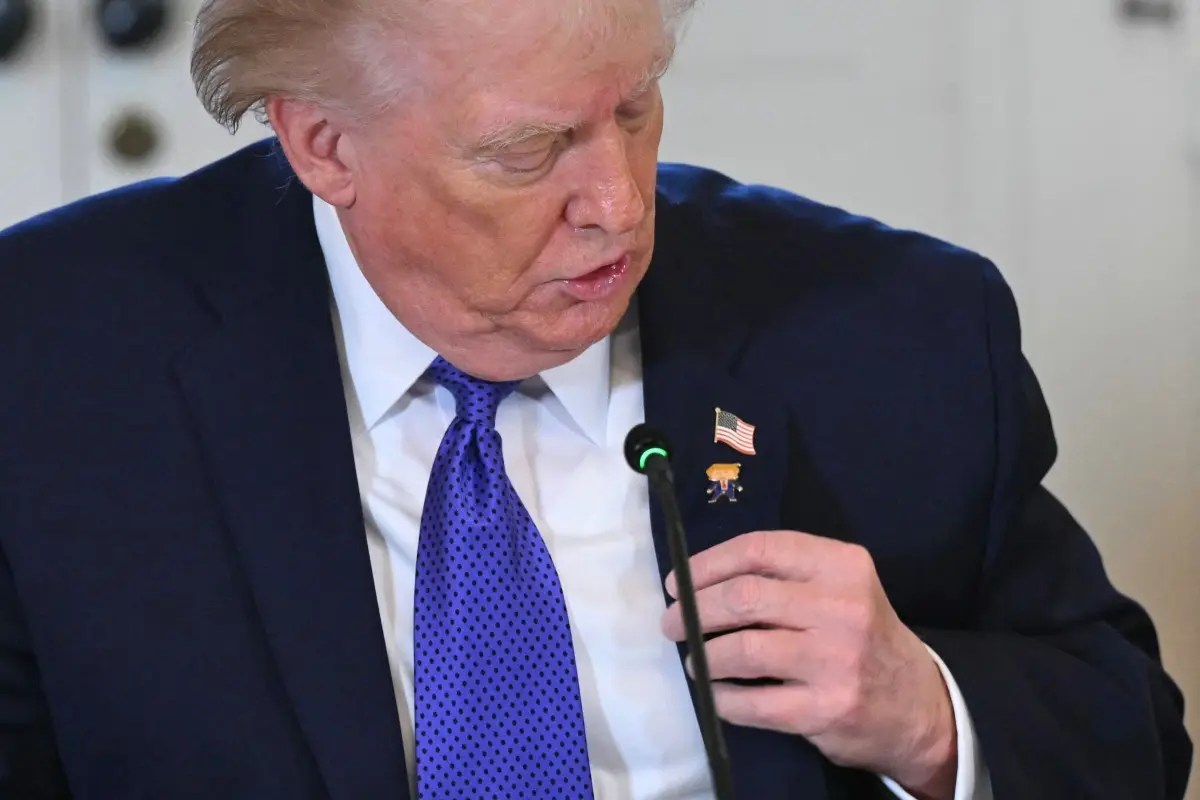 US President wears 'happy Trump’ lapel pin but says he's 'never happy' - WATCH