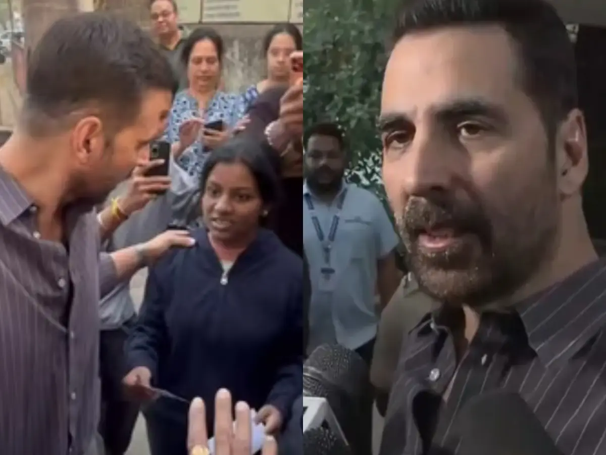 A girl touches Akshay Kumar's feet, asks for financial aid at polling booth: 'Father is in huge debt' A girl touches Akshay Kumar's feet, asks for financial aid at polling booth: 'Father is in huge debt'