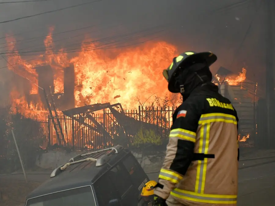 In Pics | Wildfires ravage through southern Chile, charring houses and cars