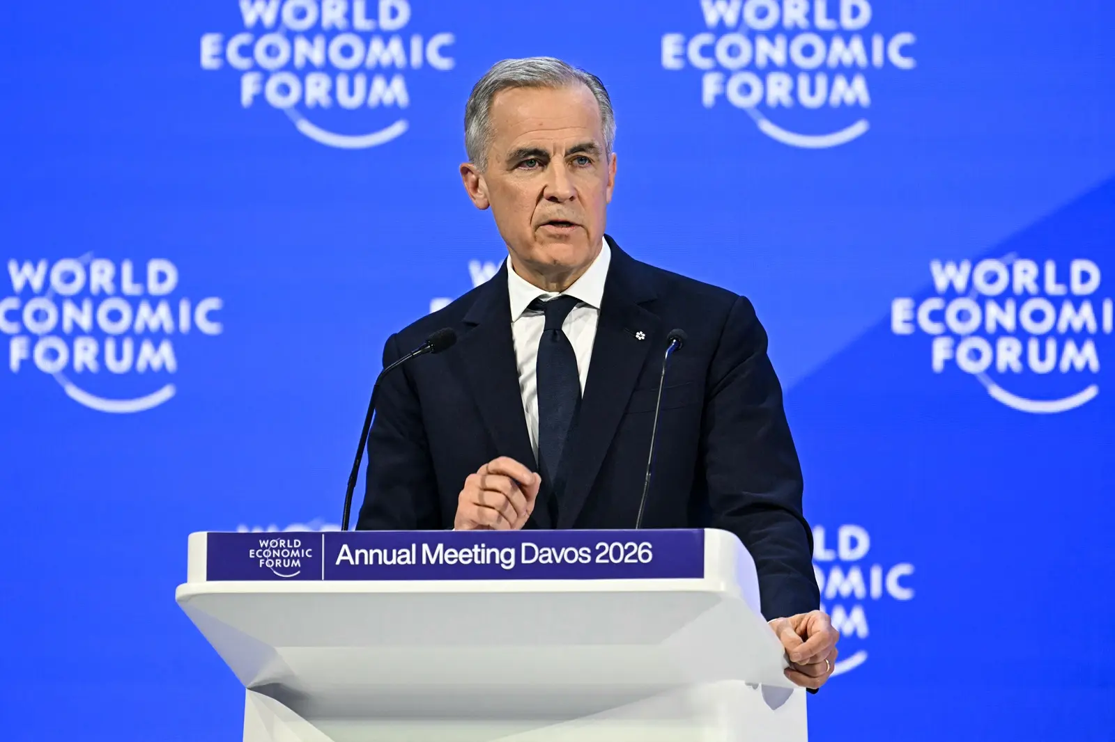 Davos 2026: 'Stands firmly' with Greenland, Denmark: Mark Carney after Trump shares AI image of US flag over Canada