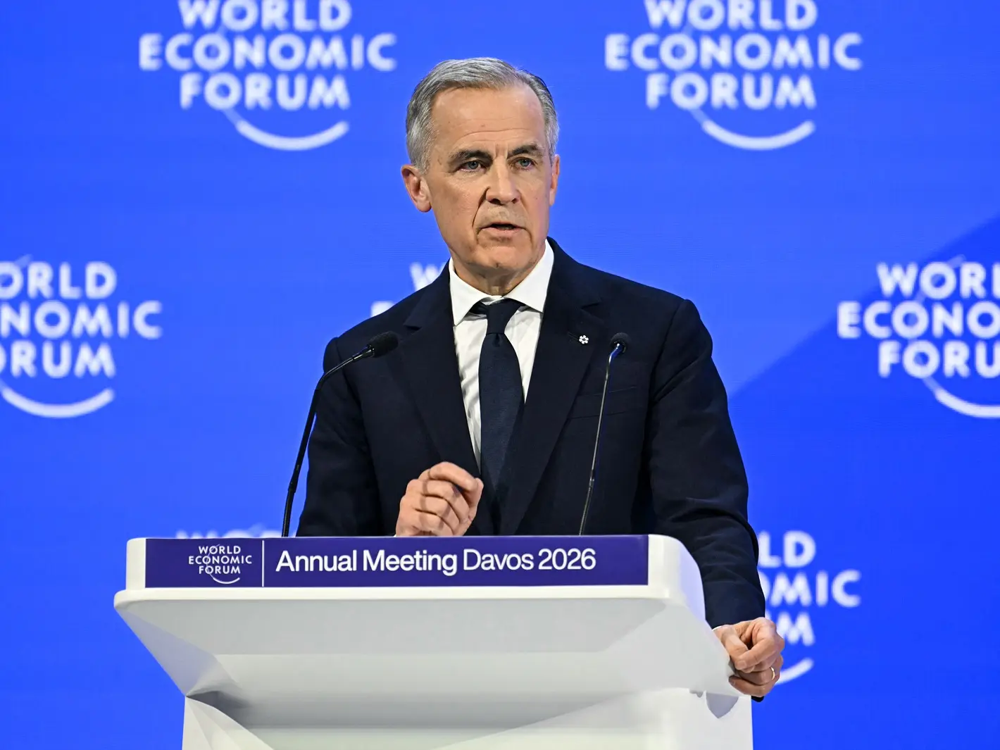Davos 2026: 'Stands firmly' with Greenland, Denmark: Mark Carney after Trump shares AI image of US flag over Canada Davos 2026: 'Stands firmly' with Greenland, Denmark: Mark Carney after Trump shares AI image of US flag over Canada