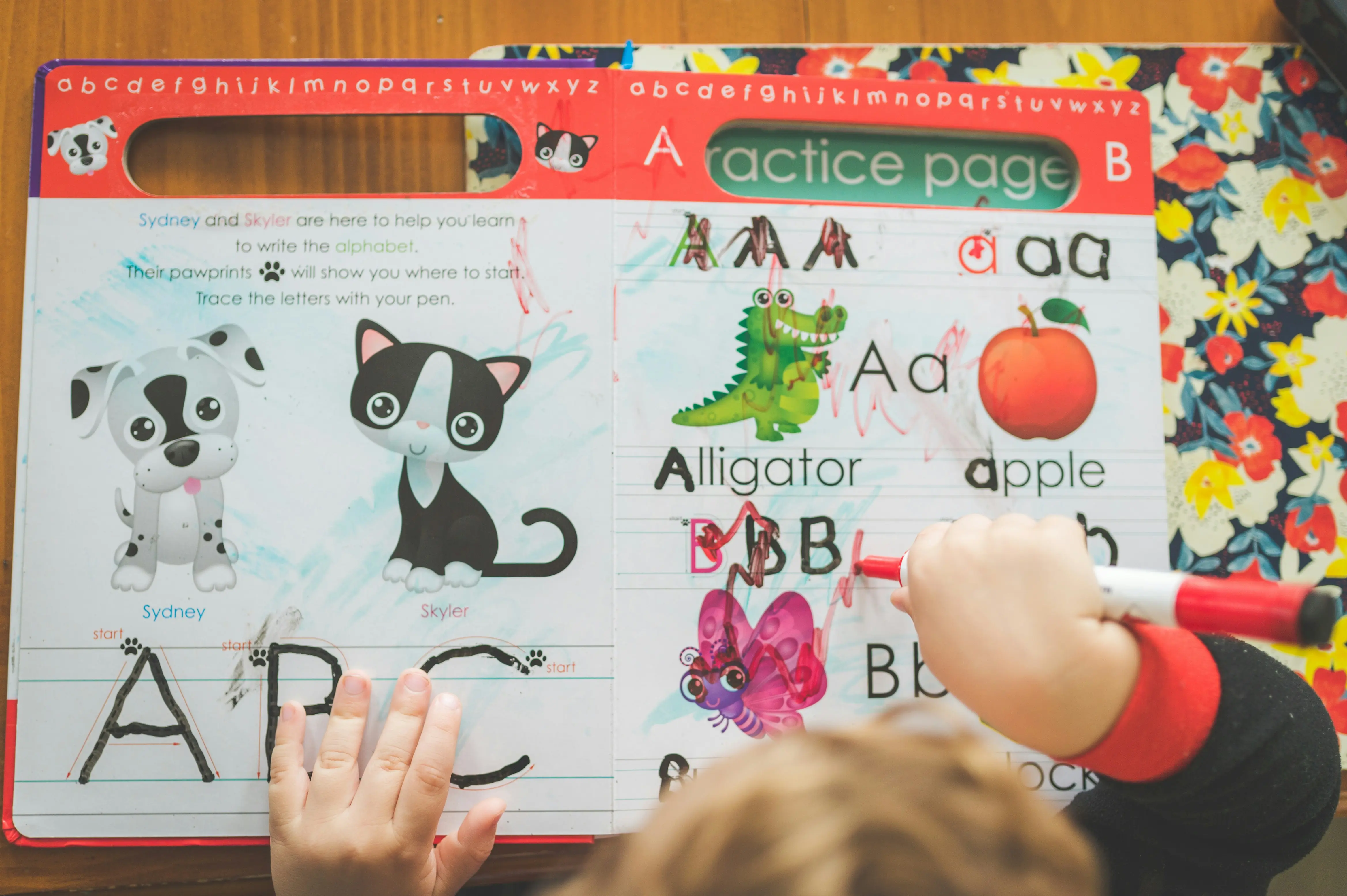 Young kids in UK can't turn pages of books and use them like phones, survey finds