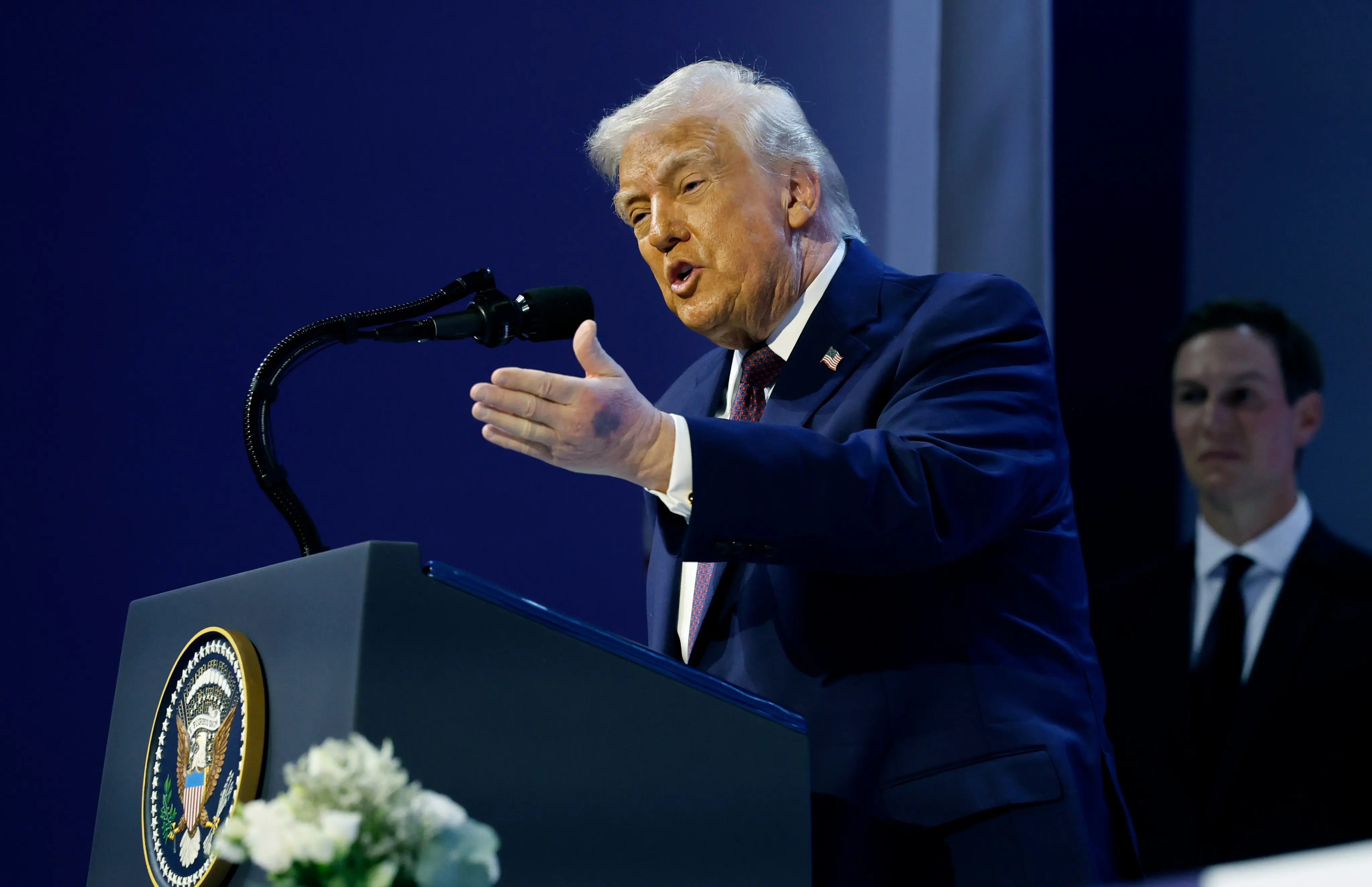 Trump addresses bruised hand at Davos, says aspirin made injury look worse