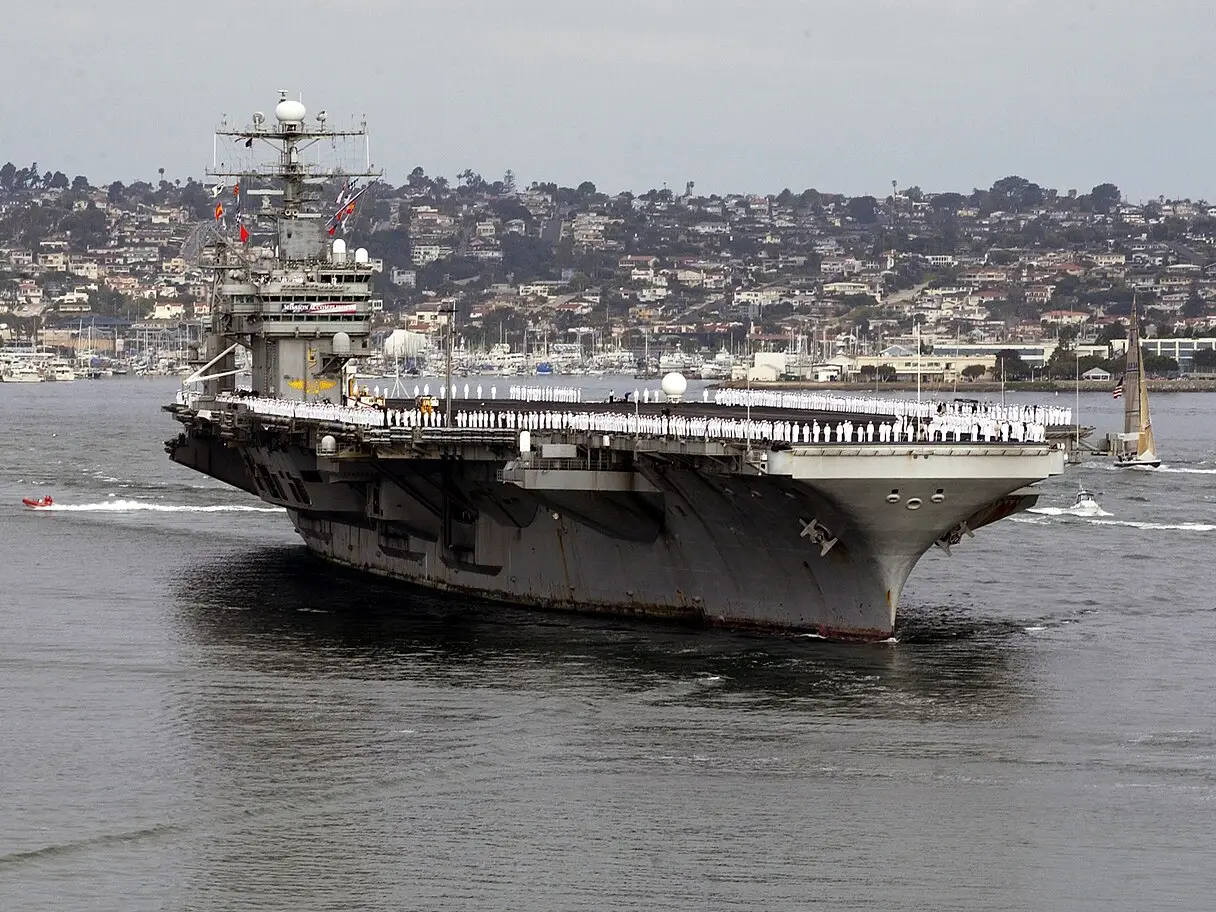 Is USS Abraham Lincoln also escorted by a submarine?