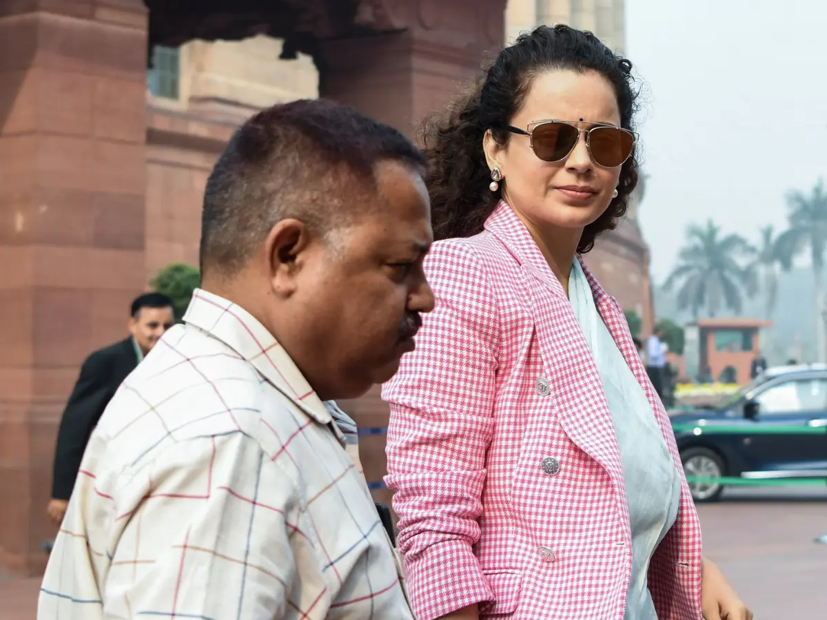 Mulmul saree with checkered blazer