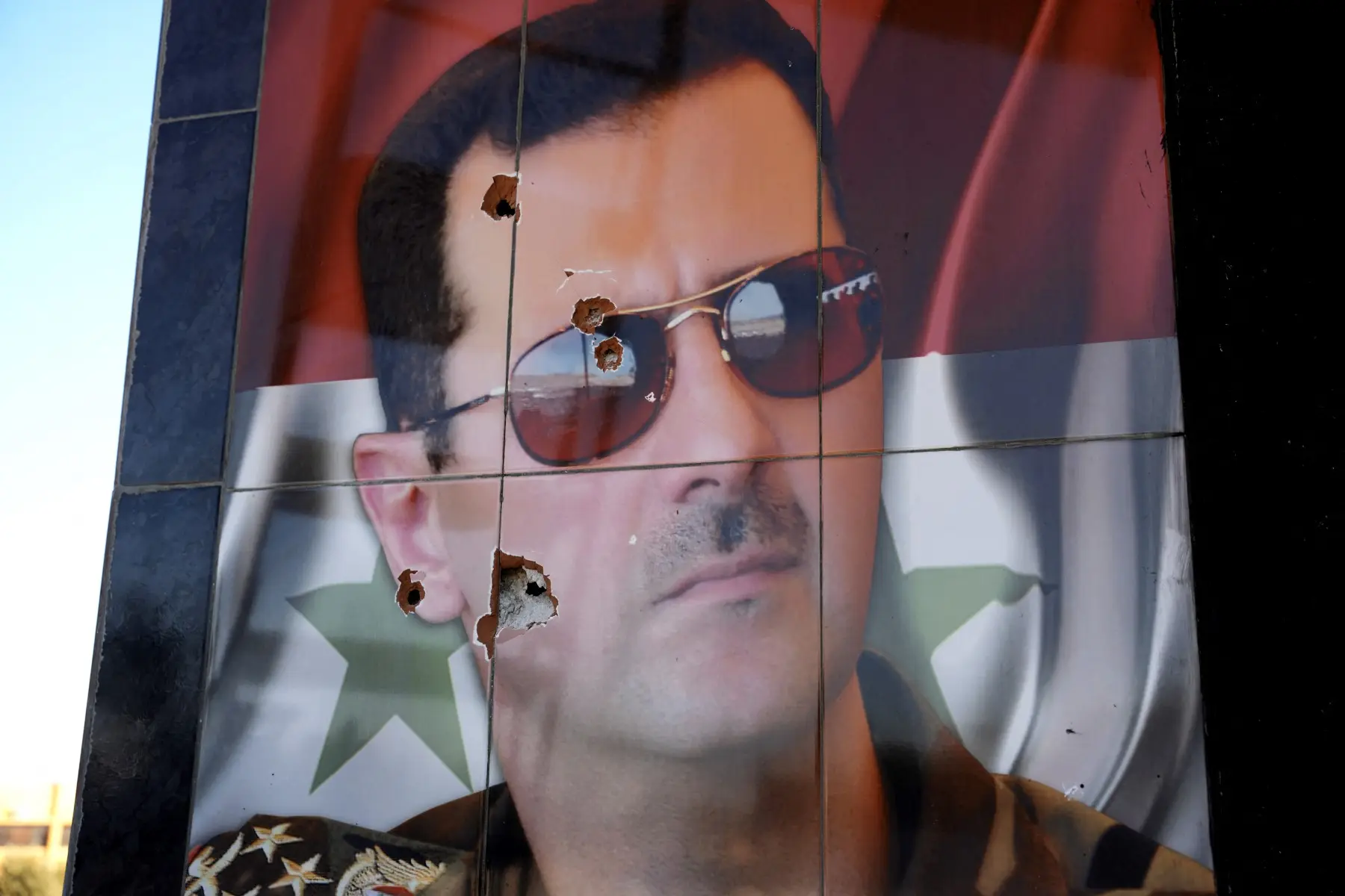 Sex crazed Bashar al-Assad had lover arrange wives of his officers, spent hours playing Candy Crush