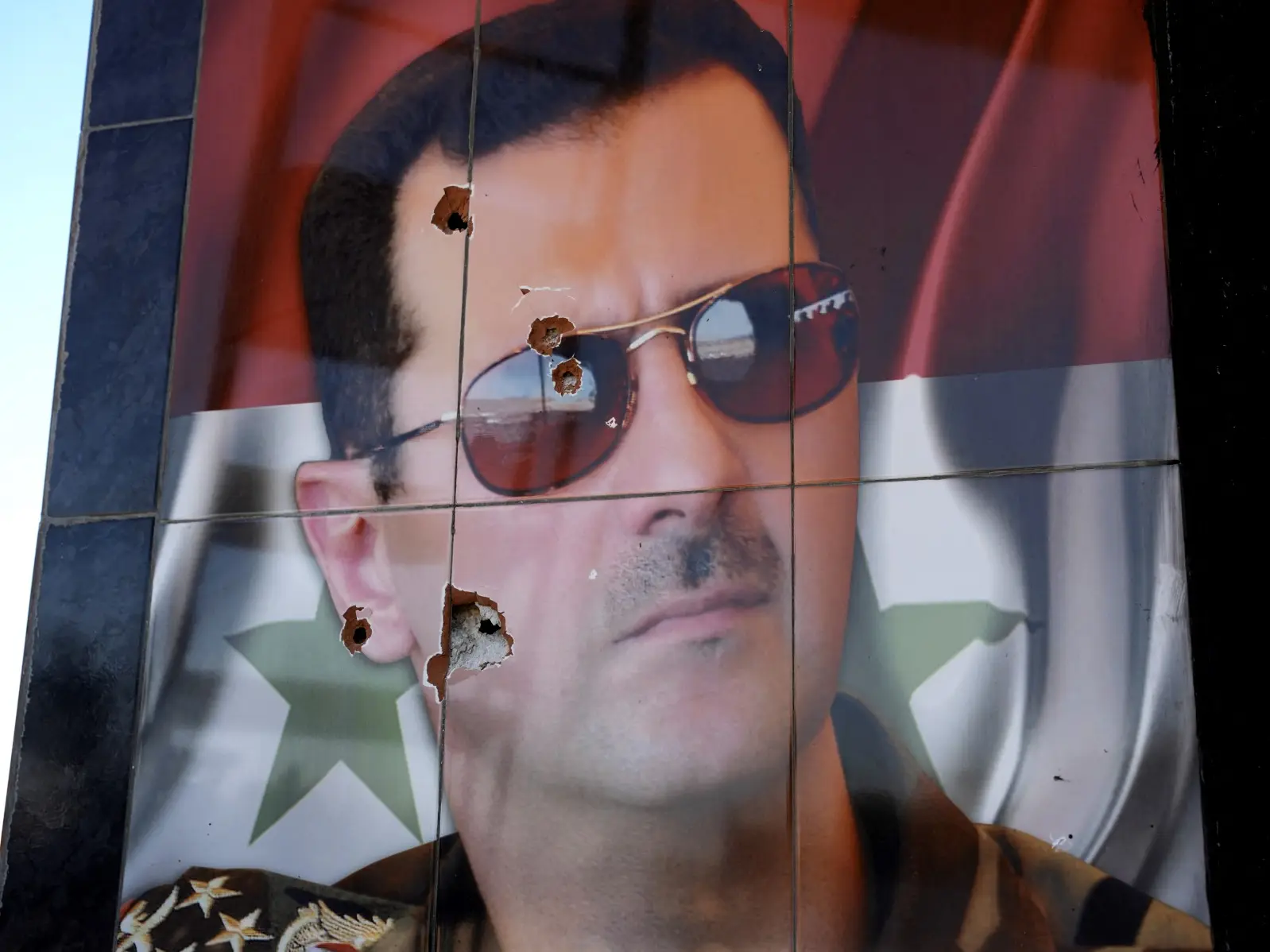 Sex crazed Bashar al-Assad had lover arrange wives of his officers, spent hours playing Candy Crush