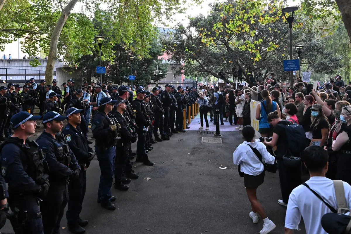 Australian lawmaker among several injured as protests over Israeli president’s visit erupt in violence